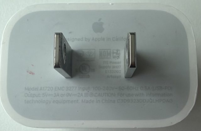 Model A1720. EMC 3277. Input 100-240V~ 50-60Hz 0.5A (USB-PD). Output 5V at 3A, or 9V at 2A. Made in China. Artesyn. E132002.